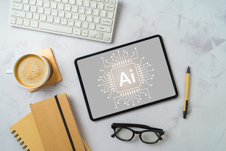 chat-bot-and-artificial-intelligence-technology-concept-with-digital-tablet-coffee-cup-and-notebooks-top-view-flat-lay